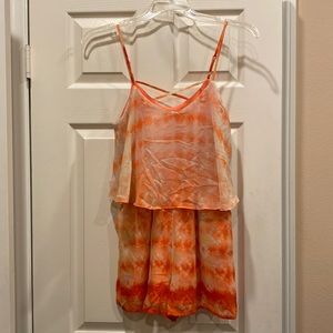 Charlotte Russe orange chiffon print romper with two pockets